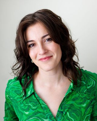Photo of Katie DeAscanis, Licensed Mental Health Counselor, MA, LMHC, RYT 200