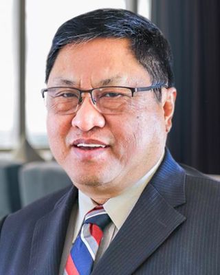 Photo of Dr. Pe Win, Psychiatrist, MD