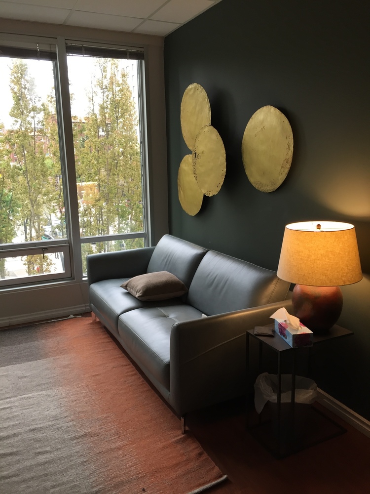 My Vancouver office with a cozy couch and a beautiful view of the urban downtown core.
