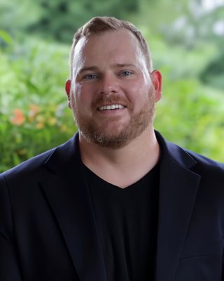 Photo of Evan Thomas, Marriage & Family Therapist, PhD, LMFTS