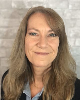 Photo of Gina Barker, Licensed Professional Counselor, EdD, LPC, LAC