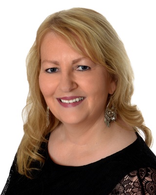 Photo of Claudine Wells - Registered Psychotherapist, CertCri, BA, BEd, MEd, OACCPP, Registered Psychotherapist