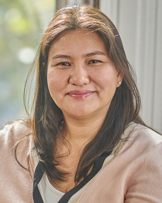 Photo of Mayumi Okuda Benavides, MD, Psychiatrist