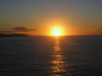 Gallery Photo of I captured this sunset while on the Pacific Ocean. Look at the halo of the sun.