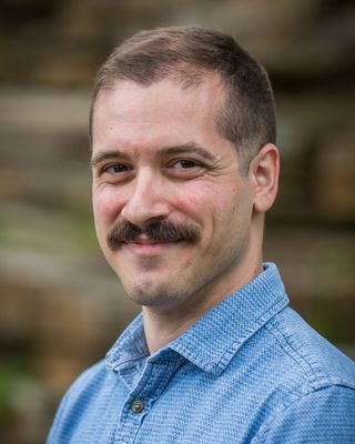 Photo of Dr. Mark Thomas, Psychologist, PhD, DBSM