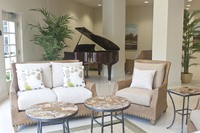 Gallery Photo of One of many sitting areas - located in front lobby, near the Baby Grand piano.