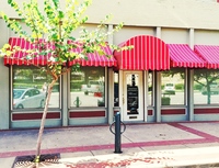Gallery Photo of My office is located in Historic Downtown San Marcos. The front door is the office with the red awning.
