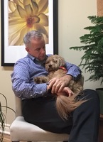 Gallery Photo of Clinical Director Todd with Therapy dog Gracey T. Bear!