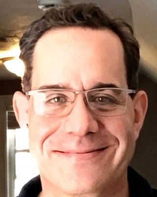 Photo of Joe Russella-Pollard, Counselor, LMHC, JD, MBA