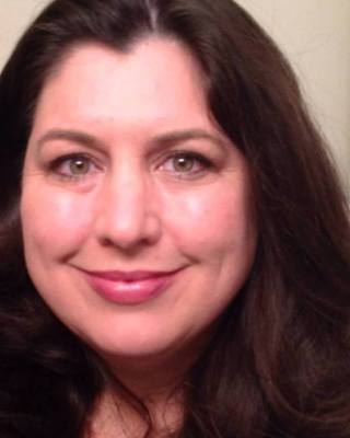 Photo of Julie Tamisiea, Licensed Clinical Mental Health Counselor, MS, LCMHC, LCAS, NCC