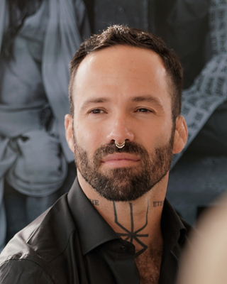 Photo of Eben A Oroz, LPC Intern, MA, RMHCI