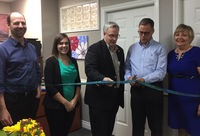Gallery Photo of Oshawa major John Henry cuts ribbon at grand opening of our new offices October 26th 2016.