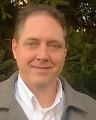Photo of Christopher E. Henderson, Licensed Professional Counselor, MA, LCMHC