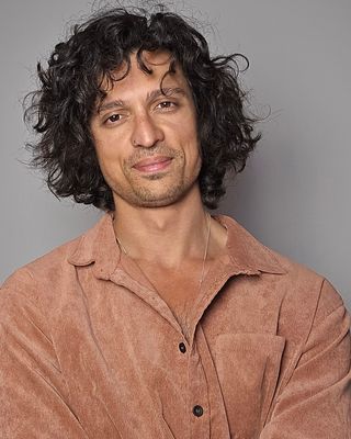 Photo of Qamar Scott, Counsellor, UKCP Trainee