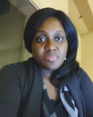 Photo of Belvine Mbubit, Psychiatric Nurse Practitioner, DNP, APRN, PMHNP