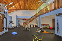 Gallery Photo of Our fitness studio where Wellness Director, Mike Kneuer, helps design custom workout programs for our patients.