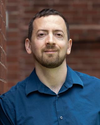 Photo of Evan Summasup, Licensed Professional Counselor, LCMHC