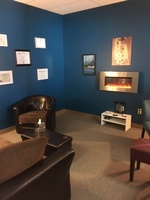 Gallery Photo of Spacious and private therapy office, complete with fireplace.