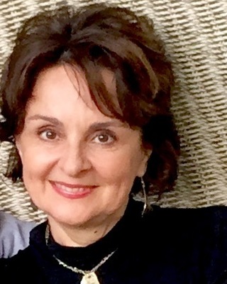 Photo of Cosmina Ionescu Vaccarino, MA, OACCPP, OATA, RP, Registered Psychotherapist in Toronto