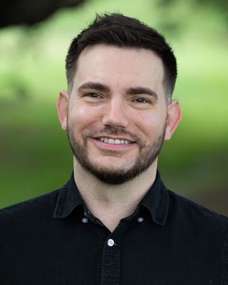 Photo of Drew Schultz - The Psychology Talk, Psychologist, PsyBA General