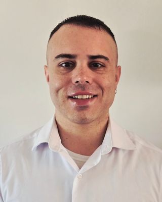 Photo of Alex Machuca, Counselor, MS, LIMHP