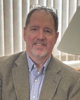 Photo of Daren M. Jaques, Counselor, MS, JD, LMHC, NCC