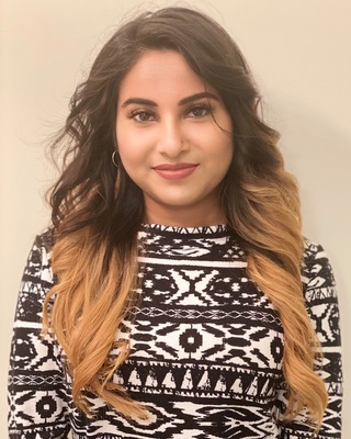 Photo of Krishe Kugan, Clinical Social Work/Therapist, MSW, RSW