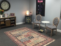 Gallery Photo of Relax in the waiting area and grab a cold drink!