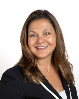 Photo of Caroline Woolf, Counselor, M.Ed., LPCC
