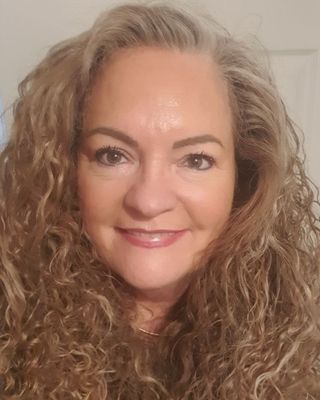 Photo of Kellie Reed, Licensed Mental Health Counselor, MA, LMHC, NCC, EMDR, TFCBT