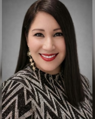 Photo of Elise Fernandez, Licensed Clinical Mental Health Counselor, LCMHC