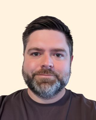 Photo of Garrett Auer, Counselor, MA, LMHC