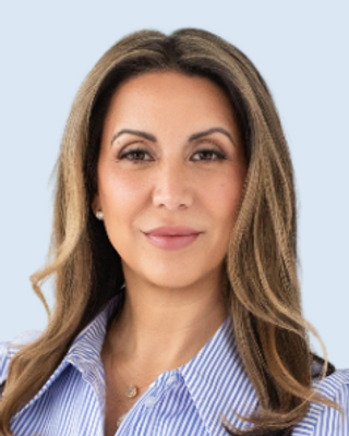 Photo of Sara Stalker - First Step Men's Therapy - Men & Partners, Registered Psychotherapist, BA, MA, RP, CSAT(C), EMDR