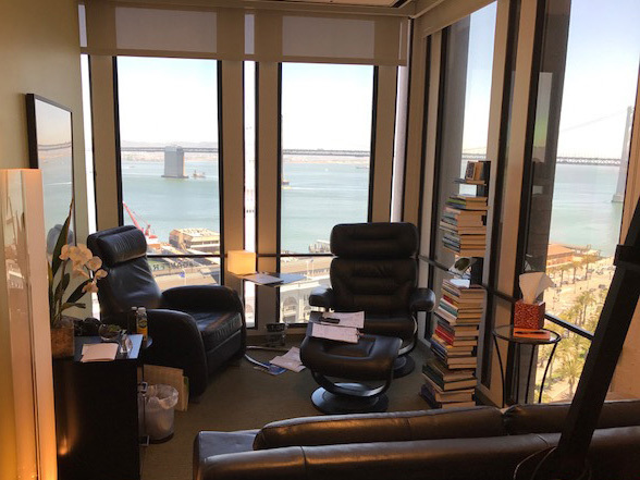 Gallery Photo of The office is cozy, and features a view of the bay, bridge, and Treasure Island