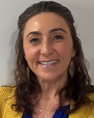 Photo of Dr. Nicole Arcuri Sanders, PhD, LPCS, LCMHCS, LPC