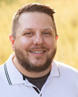 Photo of Dr. Tj Schoonover, Counselor, PhD, LCPC, RPT