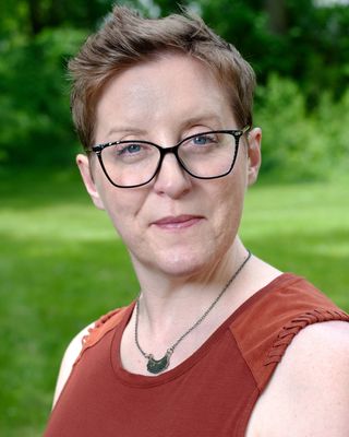 Photo of Elisa Curl-Woodruff, Counselor, PhD, LCPC, NPT-C, EMDR-II