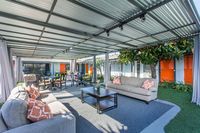 Gallery Photo of Indoor/Outdoor Lounge for Gathering and Relaxing