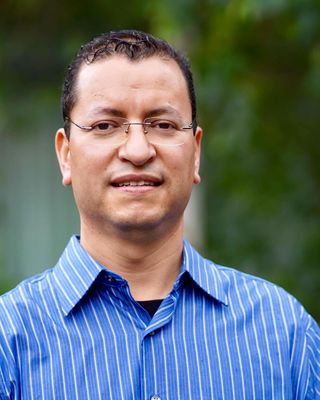 Photo of Dr. Reyes Alvarado, Psychiatric Nurse Practitioner