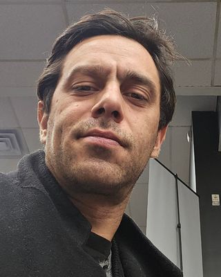 Photo of Julian Kaval, Counselor, LMHC