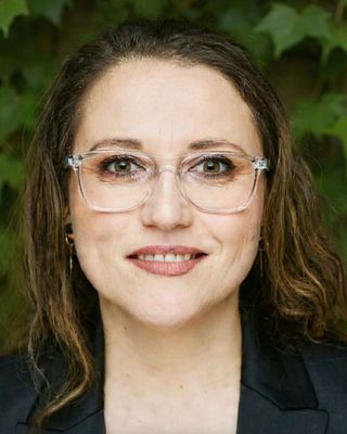 Photo of Dr. Andrada Mihaila, Counselor, LMHC, LPC, EdD