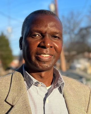 Photo of Dr. Henry Apencha, PhD, LCPC, Counselor