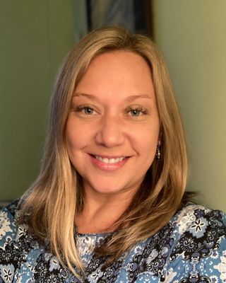 Photo of Katy Janousek, Counselor, MS, MEd, LPC