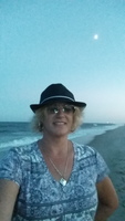 Gallery Photo of At OC, MD.  I love the ocean and beach.  Necessary part of relaxation to relieve stress and charge my batteries to continue being a good therapist! :)
