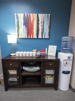 Gallery Photo of Waiting area refreshments and snacks for clients. Free wifi provided.