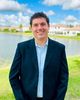 Adam L Hurlburt