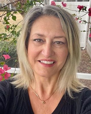 Photo of Dr. Dina Leah Ricco, Counselor, PhD, LMHC, ATR, QS