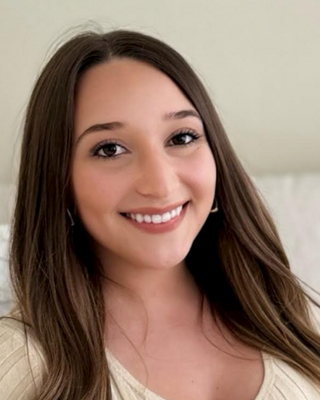 Photo of Emma Rockvam, Marriage & Family Therapist, LMFT, DBT, ACT