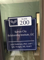 Gallery Photo of Door sign on entrance of our office