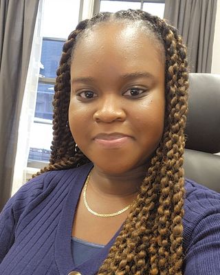 Photo of Danielle Reid, Registered Psychotherapist (Qualifying), BSc, MA